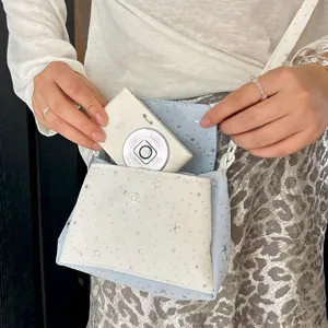 Chic star pattern crossbody camera bag, small cute shoulder bag for daily use and travel storage.