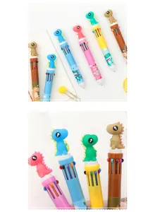 Gros plan détaillé du stylo à bille multicolore avec un charmant dinosaure mignon.