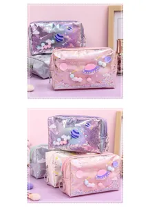Detailed close-up view of the glitter planet design holographic cosmetic storage pouch.