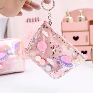 Cute laser coin purse with quicksand glitter, portable zipper keychain bag for daily use.