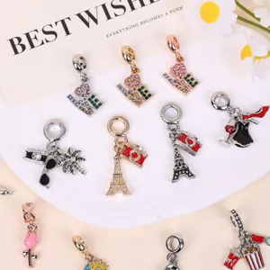 Alloy rhinestone DIY charm pendant set featuring Eiffel tower and LOVE designs for bracelets.