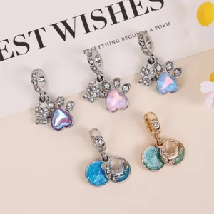 Ocean style DIY bracelet charm set featuring gradient heart paw and cute marine animal pendants.