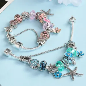 Ocean style blue and pink charm bracelets set with starfish and floral alloy beads for women.