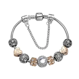 Europese stijl DIY zilver en roségoud bedelarmband met kristallen kralen en hartje.