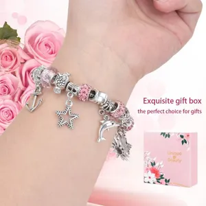 Encantador juego de pulsera de dijes rosa DIY para niños con colgantes y cuentas.