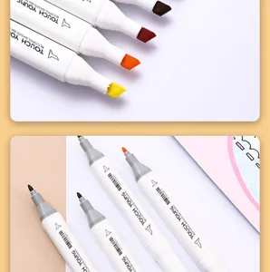 Dual head alcohol marker detail shot showing colorful nibs and clean white barrel design.