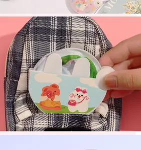 Summer cute foldable round fan detail showing pocket storage and cartoon pattern design