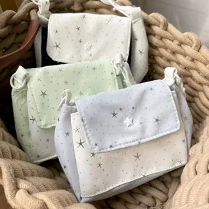 Star pattern canvas crossbody cosmetic bag detail, multi-layer storage for daily essentials.