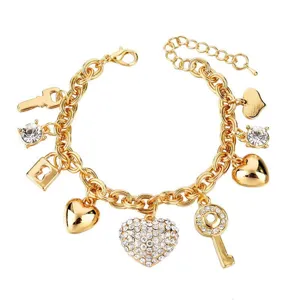 Bracciale con ciondoli oro cuore chiave lucchetto e strass gioielli moda donna