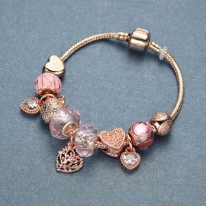 Rose gold charm bracelet with pink crystal heart beads and tree of life pendant for women