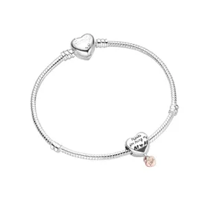 Silver snake chain charm bracelet with engraved heart charms and clasp for DIY jewelry making.