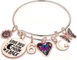 Bracciale rigido estensibile in oro rosa con vari ciondoli pendenti gioielli da donna
