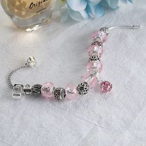 Zilveren bedelarmband met roze kristallen kraaltjes en DIY legering hangers voor dames.