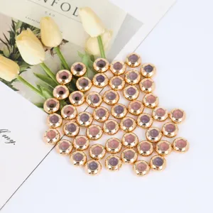Close-up detail of 6-7mm gold silicone positioning beads spacer for DIY bracelet jewelry.