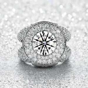 Atemberaubender geometrischer Diamantring für Damen mit funkelndem runden Mittelstein und Pavé.