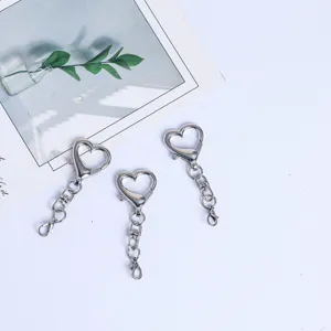 Silver heart-shaped keychain metal clasp hardware accessory for DIY crafts and bag hanging.