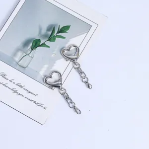 Metal heart shaped keychain with four sections chain for DIY bag charms and handmade jewelry.