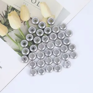 Close-up detail of silver metal silicone spacer beads for DIY jewelry making and bracelets.
