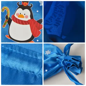 Vista dettagliata della borsa regalo con coulisse in raso natalizio blu con stampa pinguino e cuciture.