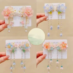 Juego de pinzas para el cabello estilo chino para niños con flores perlas borlas detalles.