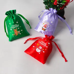 Set di sacchetti regalo natalizi in satin, buste per caramelle colorate con simpatici motivi.