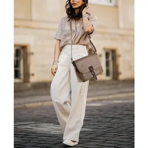 Vintage brown leather crossbody messenger bag for women, spacious shoulder bag with strap.