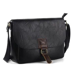 Vintage leather messenger bag with crossbody strap and contrast buckle detail for daily use.