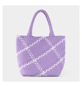 Handmade woven tote bag with purple and white contrast grid design for daily use.