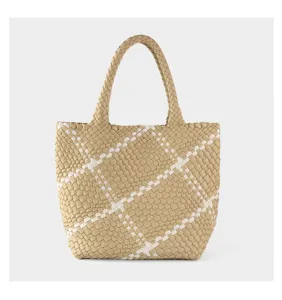Handmade woven tote bag for women, stylish color block design, large capacity shoulder bag.