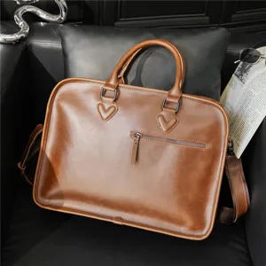 Detailed view of retro brown leather men briefcase, structured business shoulder bag feature.
