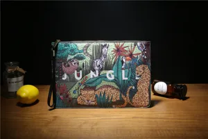 Close-up view of the stylish jungle print men clutch bag featuring unique animal graphic details.