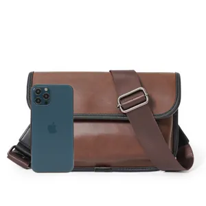 Brown PU leather crossbody bag for men and women, casual vintage messenger shoulder bag.