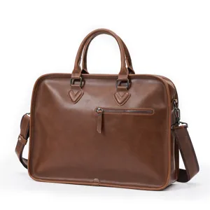 Vintage brown leather briefcase for men, professional business handbag with shoulder strap.