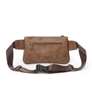 Brown leather fanny pack detail view, front zipper pocket and durable adjustable strap display.