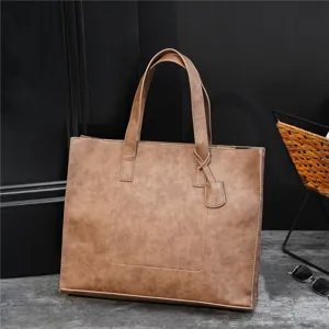 PU leather tote bag for men and women, stylish horizontal shoulder handbag with spacious storage.