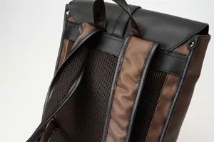 Close-up detail view of retro PU leather backpack back straps and breathable mesh.