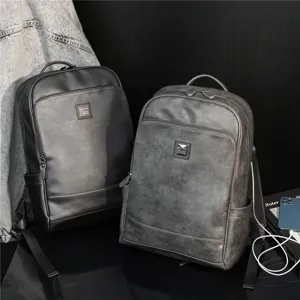 Zaino casual da uomo effetto pelle dettaglio, ideale per viaggio, lavoro e uso quotidiano.