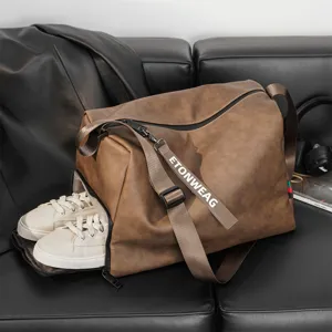Large capacity travel duffel bag with independent shoe compartment and stylish PU leather finish.