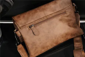 Men brown PU leather messenger bag detail, vintage crossbody bag with zipper pocket and flap.