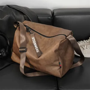 Stylish large capacity casual shoulder bag for men, vintage brown leather gym travel bag.