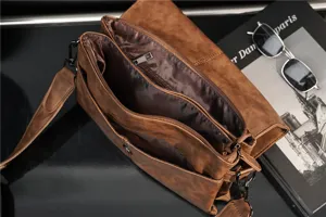 Detailed view of the stylish brown men's leather shoulder bag with spacious compartments.