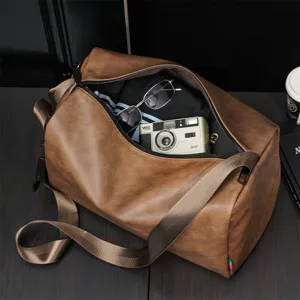 Large capacity brown leather travel duffel bag for men casual shoulder crossbody bag.
