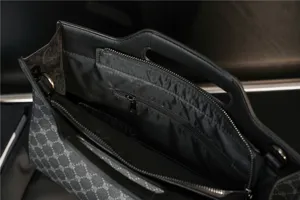Detailed view of men's business casual briefcase interior pocket and stylish monogram canvas design.