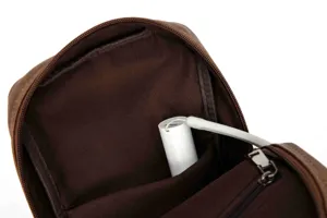Detail view of brown leather chest bag, men's casual single shoulder backpack interior.