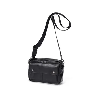 Men black leather crossbody shoulder bag with zipper pockets and adjustable strap for daily use.