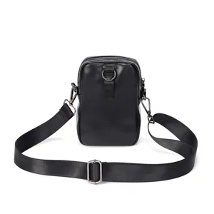 Bolso cruzado minimalista de cuero negro, bolsa para teléfono con correa ajustable y hebilla.