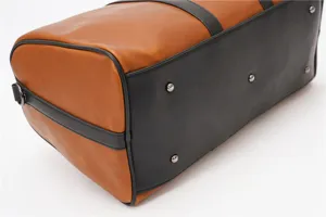 Men's vintage large capacity travel duffel bag, detailed bottom view with metal protective studs.