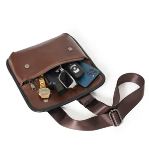 Brown PU leather crossbody bag, stylish vintage messenger bag for daily commute use.