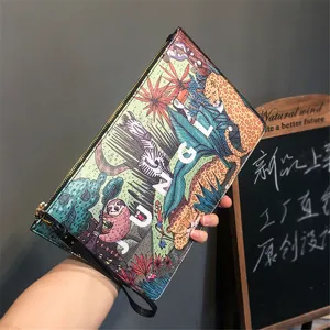Stylish jungle print clutch bag with zipper closure and wrist strap for daily casual streetwear.