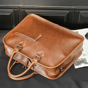 Vintage brown leather briefcase for men, business laptop shoulder bag and stylish handbag.